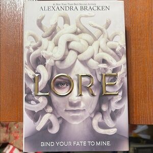 Lore Book by Alexandra Bracken - White and Gold Cover